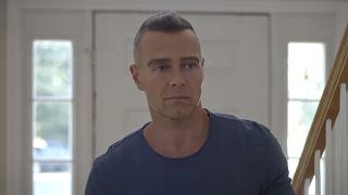 Joey Lawrence's Jack standing near the front door in Frankie Meets Jack