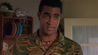 Obi playing Bodie on Dawson's Creek Season 1 in a green shirt.