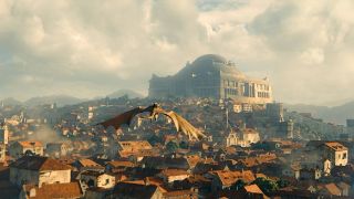 A dragon flies over King's Landing in House of the Dragon