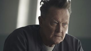 Robert Patrick as Auggie Smith in prison uniform