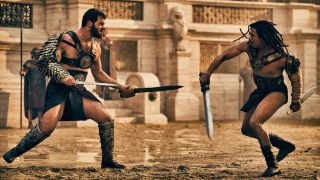 Two Roman gladiators clash in the Colosseum in swords-and-sandals epic Those About to Die 