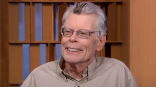 Stephen King smiling during interview with Michael Strahan on Good Morning America