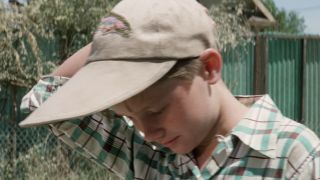 Scotty looking sad in his hat in The Sandlot