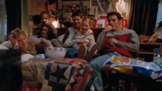 The Dawson's Creek cast crowding on Dawson's bed during Season 2.