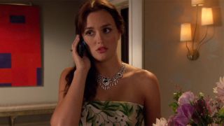 Blair talking on the phone in a green dress and necklace Season 5.