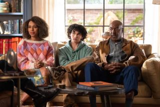 Paige, Finn and Edwin - played by Kerry Washington, Faly Rakotohavana, and Delroy Lindo - squeeze together on the therapist's couch in UnPrisoned Season 2 